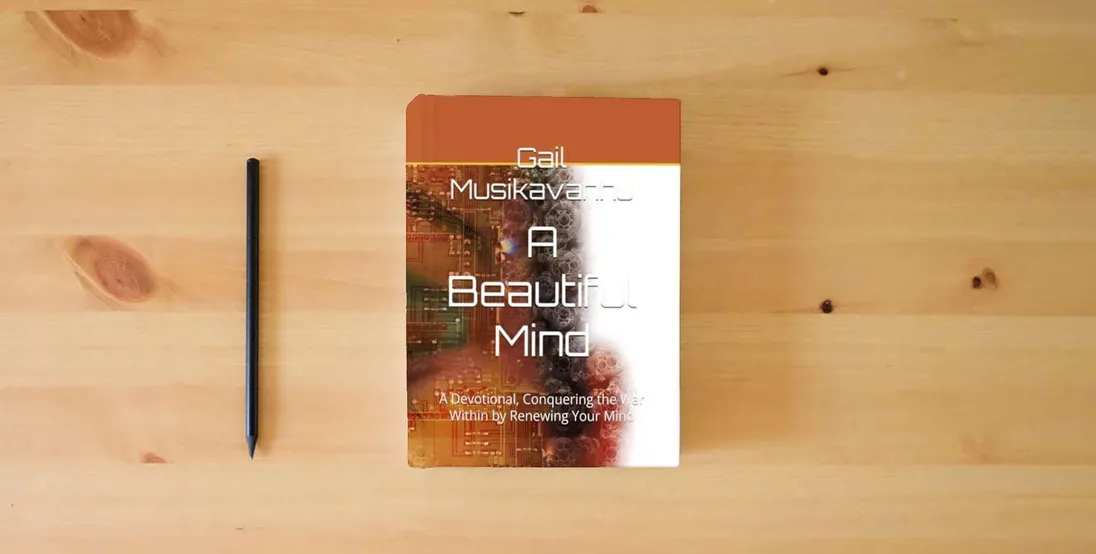The book A Beautiful Mind: A Devotional, Conquering the War Within by Renewing Your Mind (Renewing Your Mind Devotionals)} is on the table