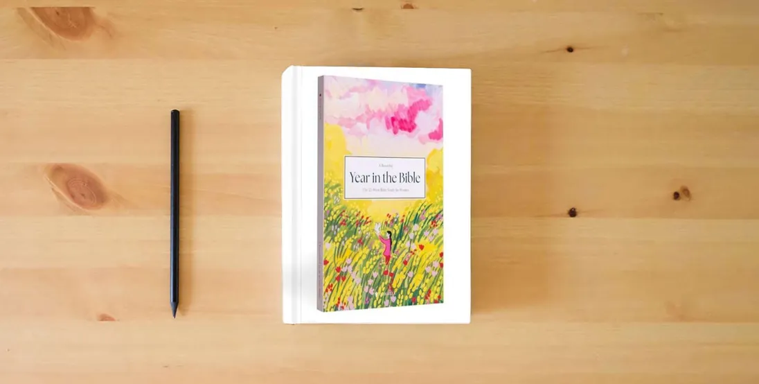 The book A Beautiful Year in the Bible: The 52-Week Bible Study for Women} is on the table