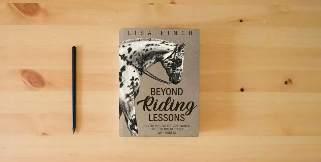 The book Beyond Riding Lessons: Understanding Biblical Truths Through Interactions With Horses} is on the table