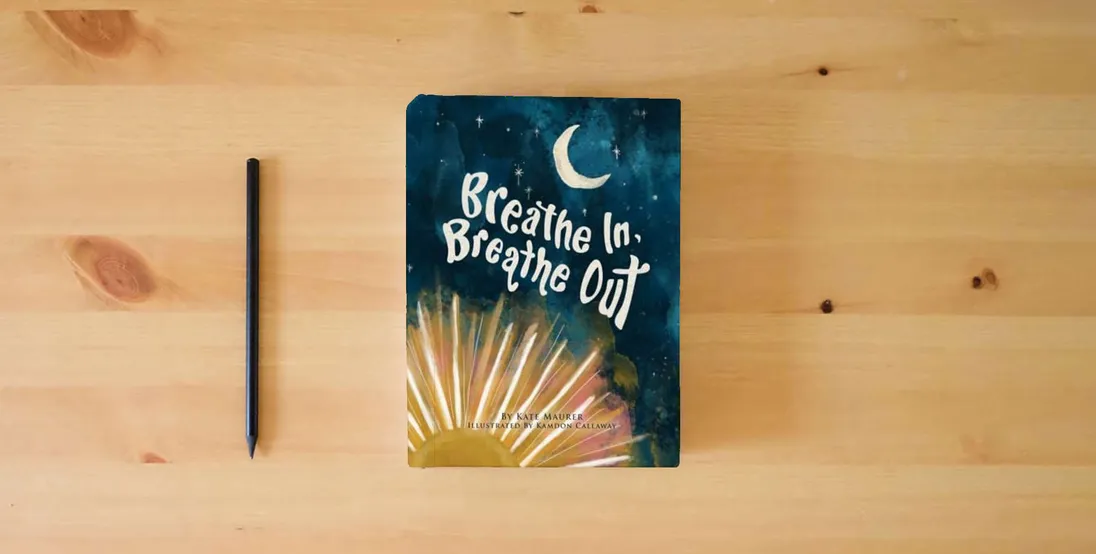 The book Breathe In, Breathe Out: An Interactive Bedtime Book for Kids and Parents} is on the table