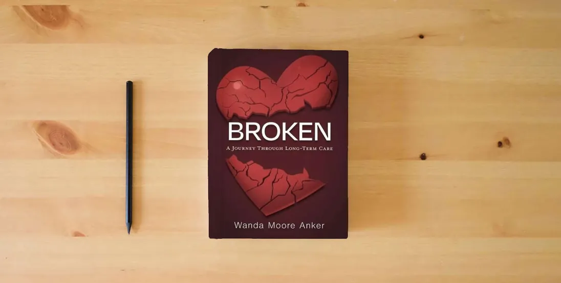 The book Broken: A Journey Through Long Term Care} is on the table