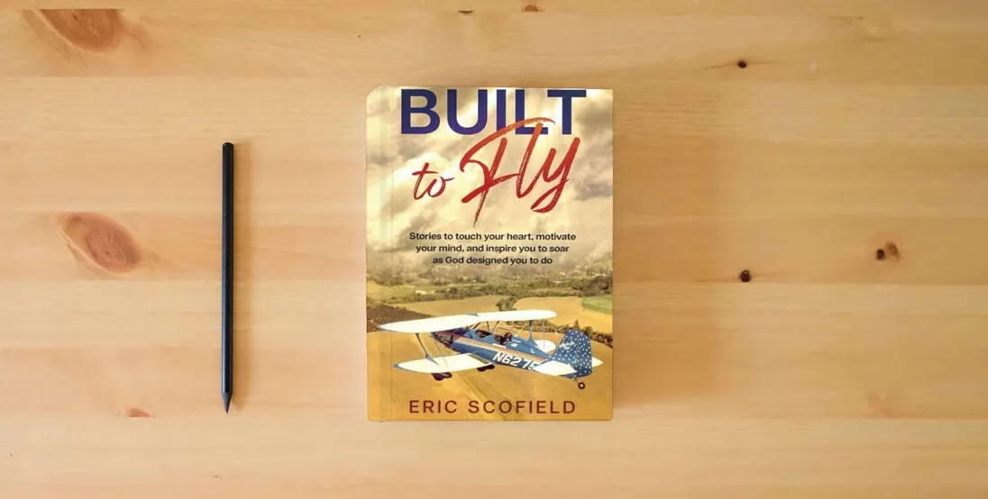 The book Built To Fly: Stories to touch your heart, motivate your mind, and inspire you to soar as God designed you to do} is on the table