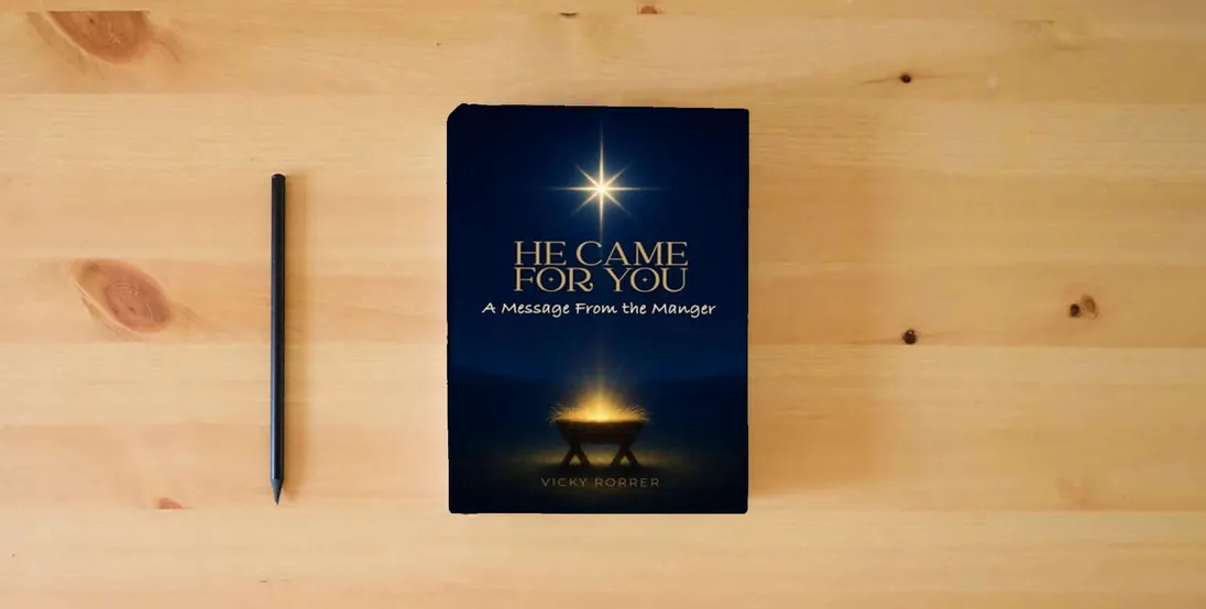 The book HE CAME FOR YOU: A Message From the Manger} is on the table