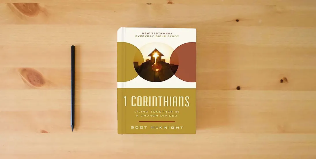 The book 1 Corinthians: Living Together in a Church Divided (New Testament Everyday Bible Study Series)} is on the table