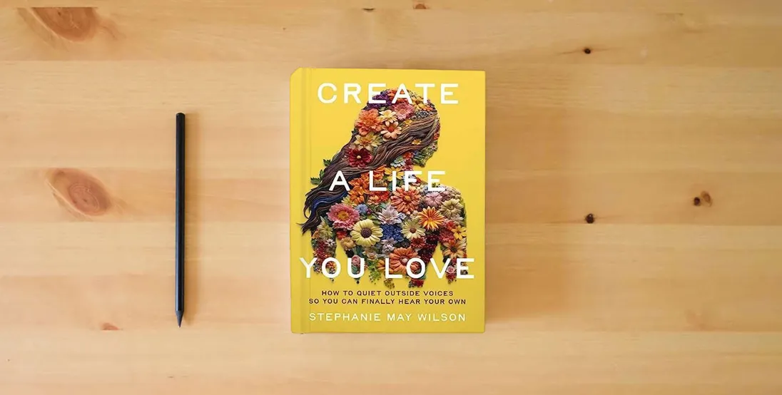 The book Create a Life You Love: How to Quiet Outside Voices So You Can Finally Hear Your Own} is on the table