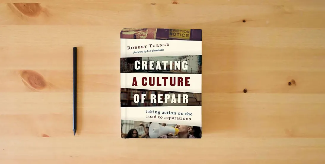 The book Creating a Culture of Repair: Taking Action on the Road to Reparations} is on the table