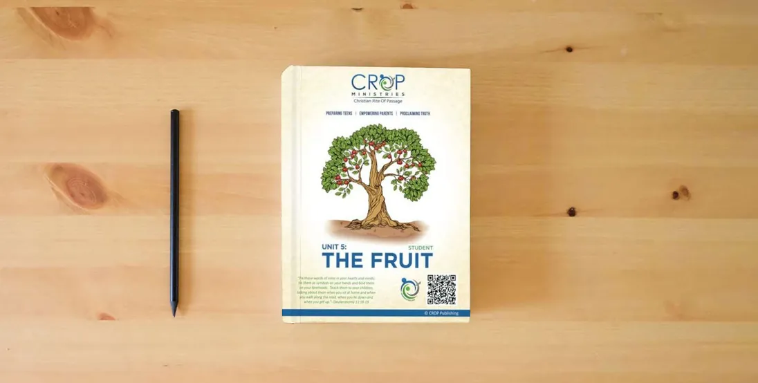The book CROP Unit 5: Student: The Fruit} is on the table