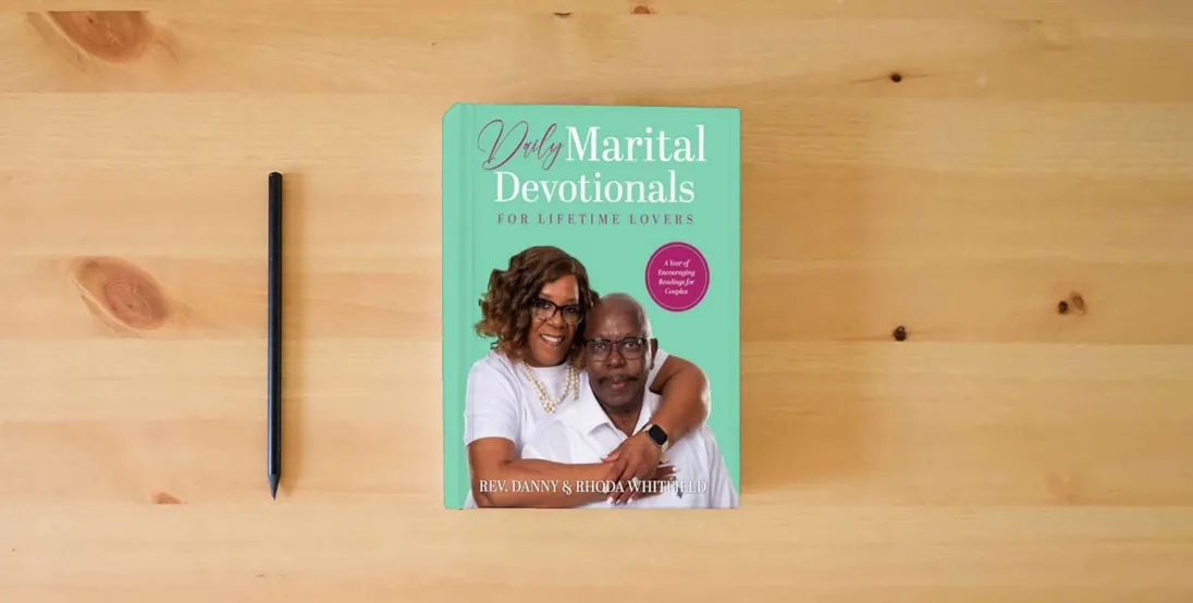 The book Daily Marital Devotionals for Lifetime Lovers: A Year of Encouraging Readings for Couples} is on the table