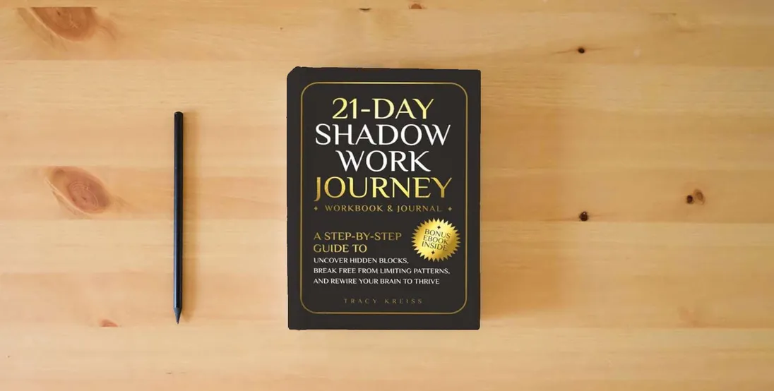 The book 21-Day Shadow Work Journey: A Step-by-Step Guide to Uncover Hidden Blocks, Break Free From Limiting Patterns, and Rewire Your Brain to Thrive} is on the table