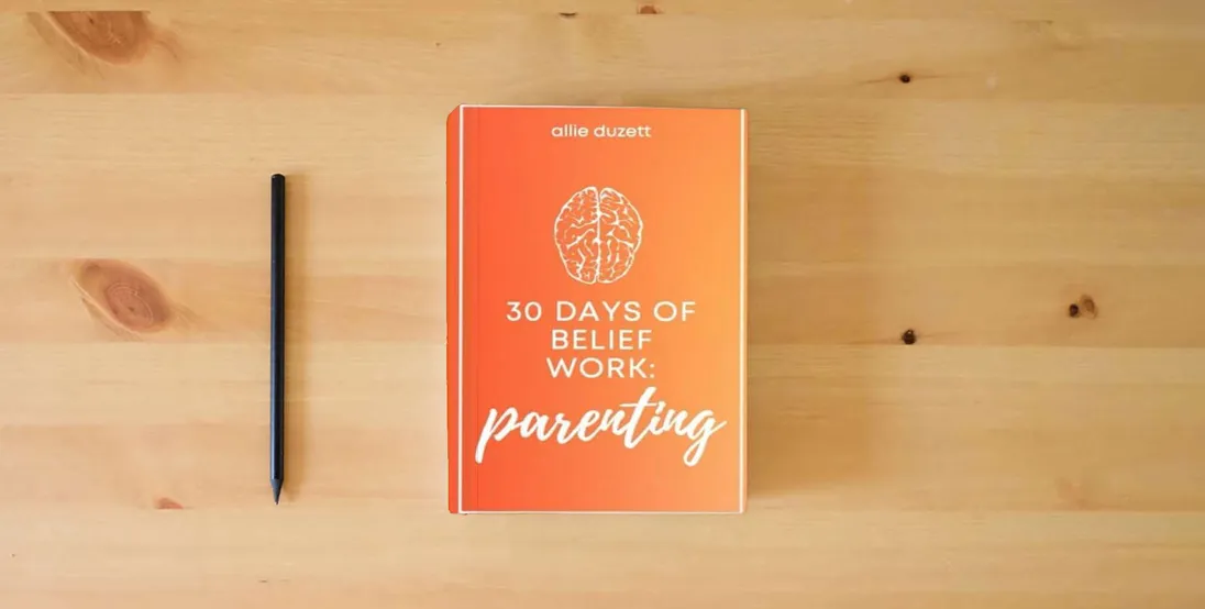 The book 30 Days of Belief Work: Parenting} is on the table