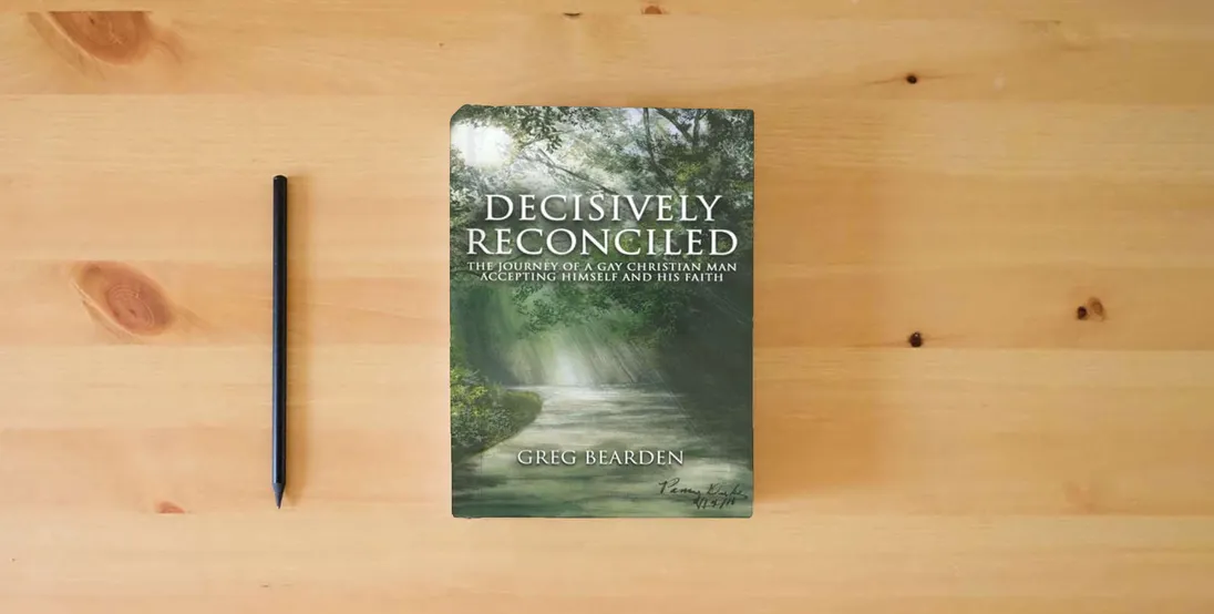 The book Decisively Reconciled: The Journey of a Gay Christian Man Accepting Himself and His Faith} is on the table