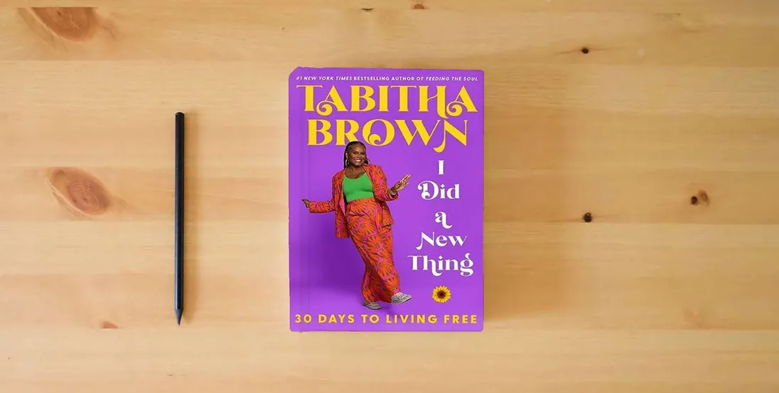 The book I Did a New Thing: 30 Days to Living Free (A Feeding the Soul Book)} is on the table