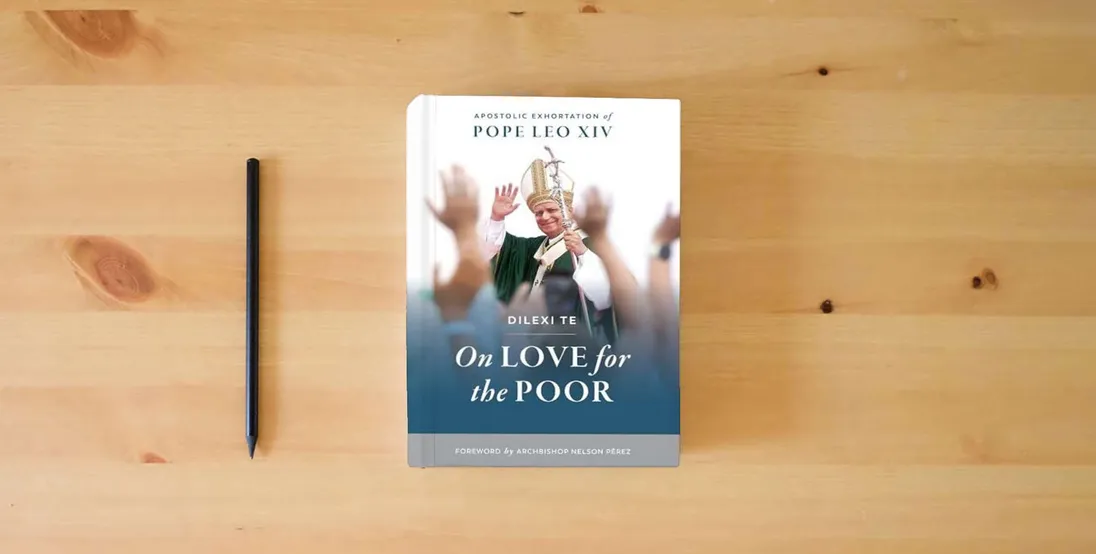 The book Dilexi te} is on the table