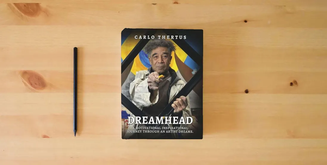 The book Dreamhead: A Motivational Inspirational Journey Through an Artist’s Dreams} is on the table