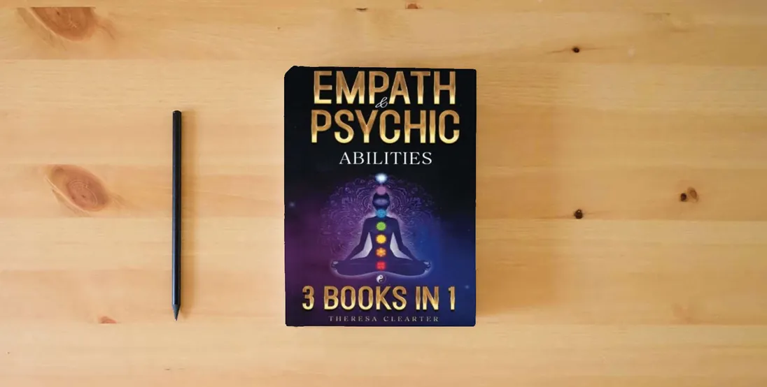 The book Empath and Psychic Abilities Bible | 3 BOOKS IN 1: Unlocking Your Inner Potential & Managing Your Psychic Gifts Through Intuition, Clairvoyance and Meditation [II EDITION]} is on the table