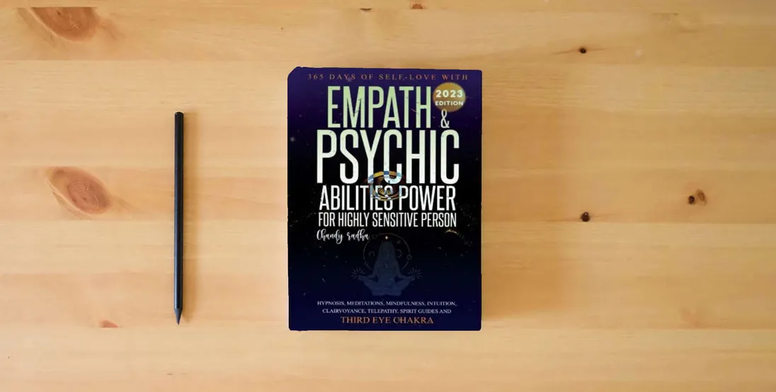 The book Empath & Psychic Abilities Power For Highly Sensitive Person: 365-Days of Self Love With : Intuition, Mindfulness, Clairvoyance, Telepathy, Spirit Guide and Third Eye Chakra} is on the table