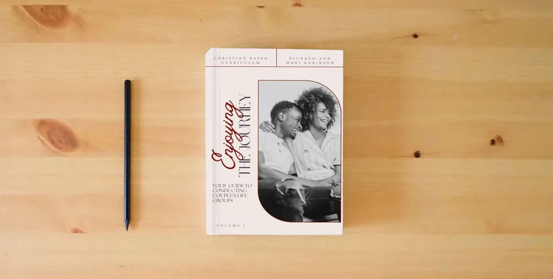The book Enjoying the Journey: Your Guide to Conducting Couple's Life Groups} is on the table