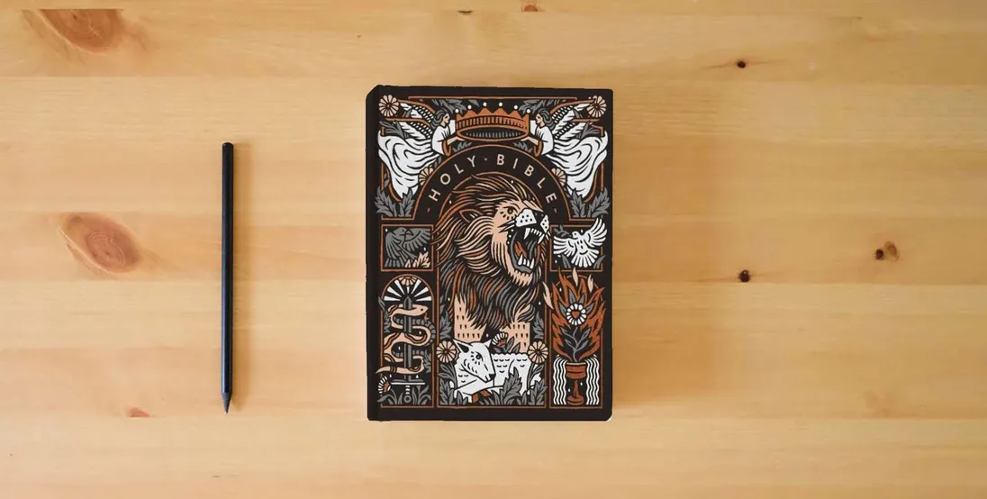 The book ESV Single Column Journaling Bible, Artist Series (Hardcover, Joshua Noom, The Lion and the Lamb)} is on the table