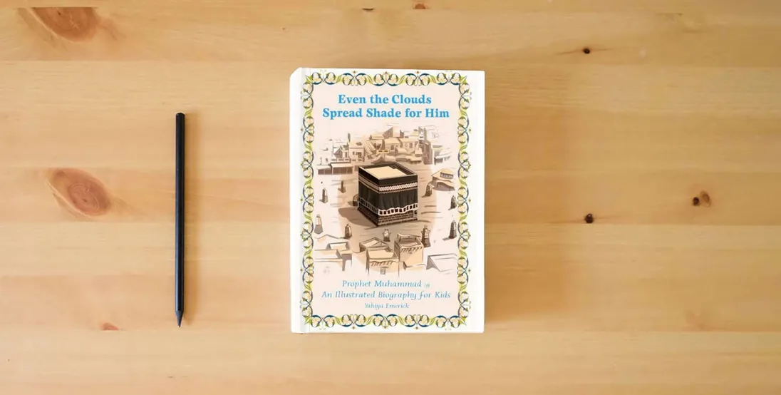 The book Even the Clouds Spread Shade for Him: Expanded Textbook Edition} is on the table