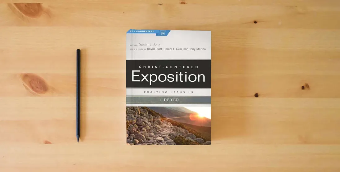 The book Exalting Jesus in 1 Peter (Christ-Centered Exposition Commentary)} is on the table