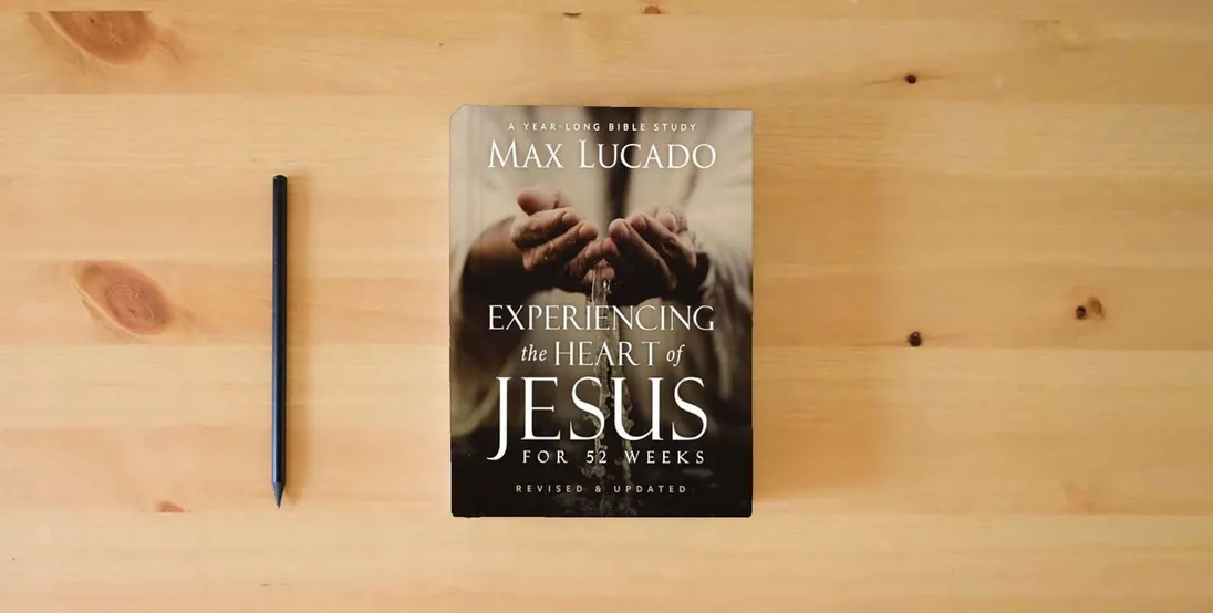 The book Experiencing the Heart of Jesus for 52 Weeks Revised and Updated: A Year-Long Bible Study (Life Lessons Bible Study)} is on the table