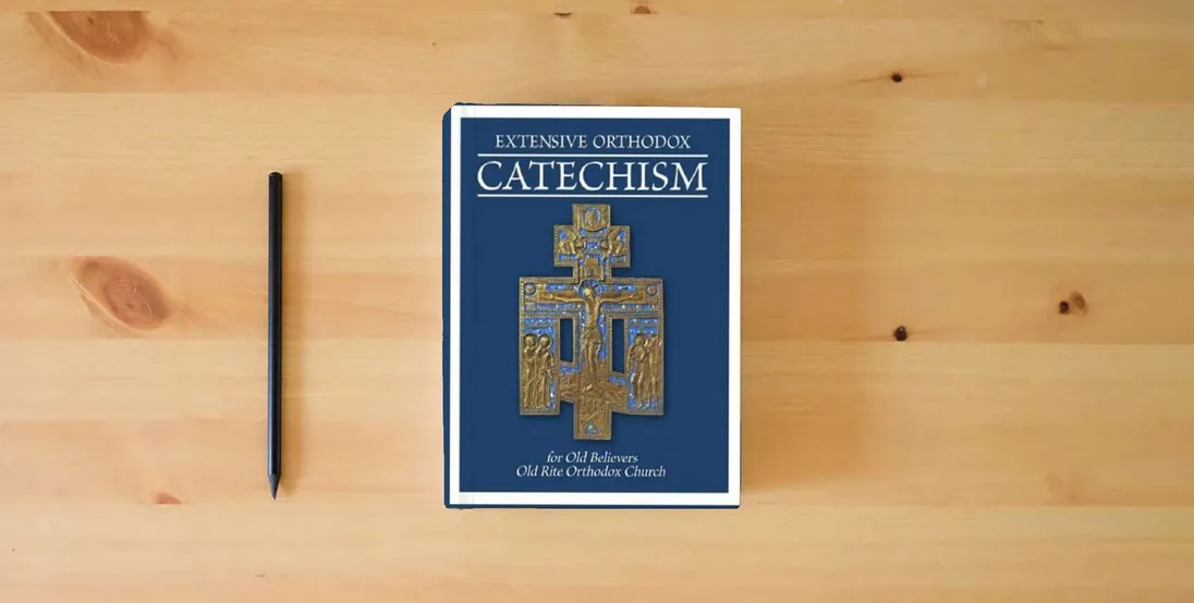 The book EXTENSIVE ORTHODOX CATECHISM: For Old Believers} is on the table