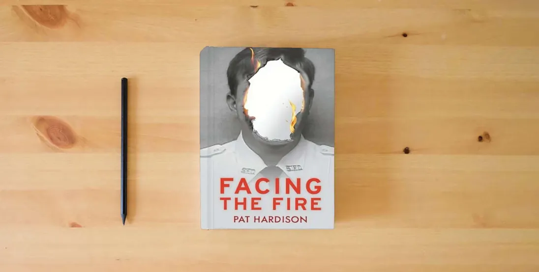 The book Facing the Fire} is on the table