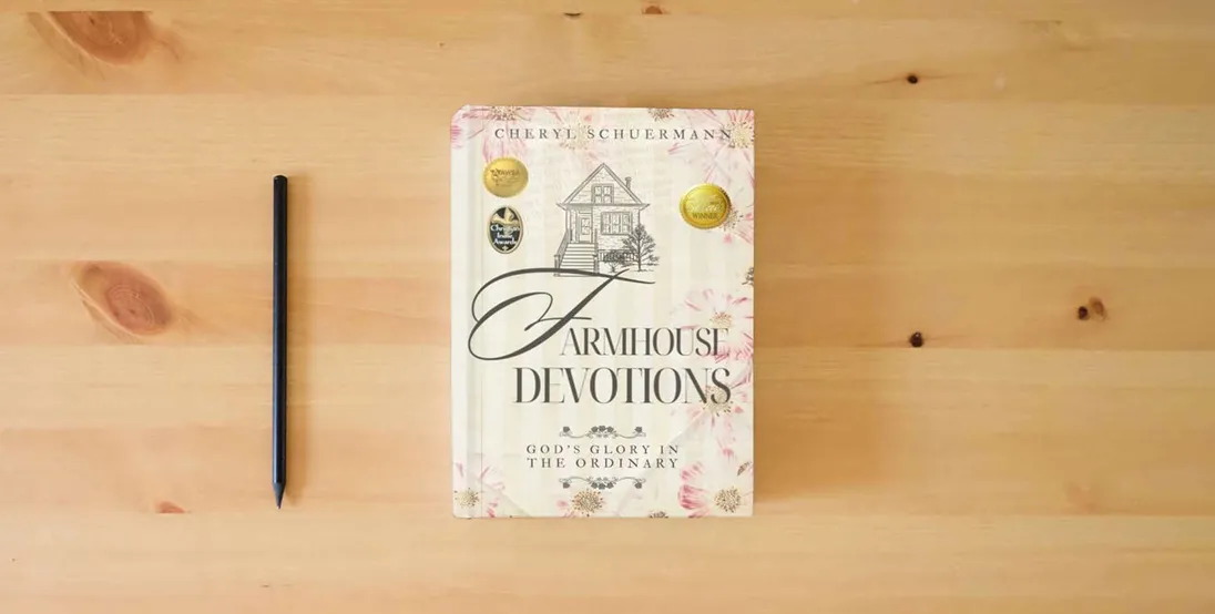 The book Farmhouse Devotions: God's Glory in the Ordinary} is on the table