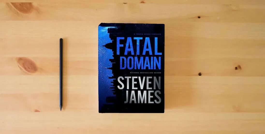 The book Fatal Domain} is on the table