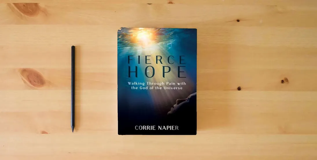 The book Fierce Hope: Walking Through Pain with the God of the Universe} is on the table