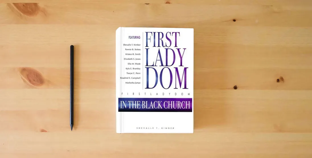 The book FirstLadyDom In The Black Church} is on the table