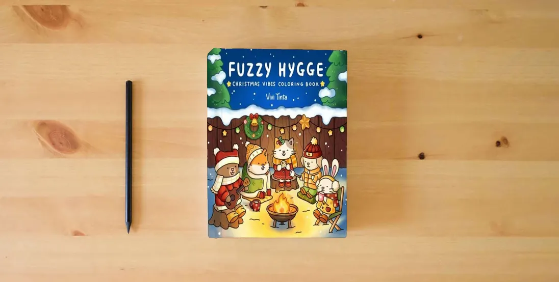 The book Fuzzy Hygge: Christmas Vibes Coloring Book for Adults & Teens Featuring Cozy Festive Holiday Winter Scenes with Adorable Animals Characters (Fuzzy Friends Coloring)} is on the table