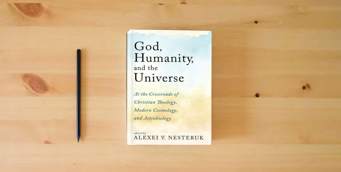 The book God, Humanity, and the Universe: At the Crossroads of Christian Theology, Modern Cosmology, and Astrobiology} is on the table