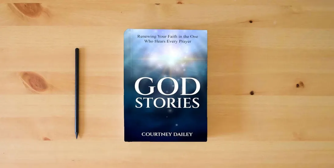 The book God Stories: Renewing Your Faith in the One Who Hears Every Prayer} is on the table