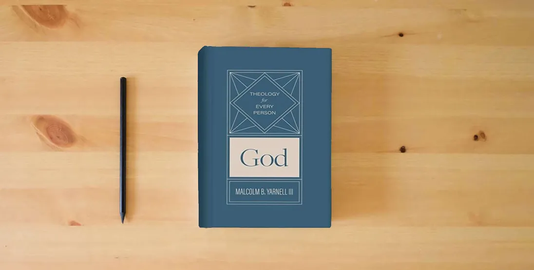 The book God (Volume 1) (Theology for Every Person)} is on the table