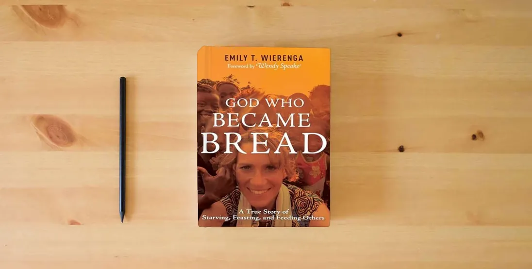 The book God Who Became Bread: A True Story of Starving, Feasting, and Feeding Others} is on the table