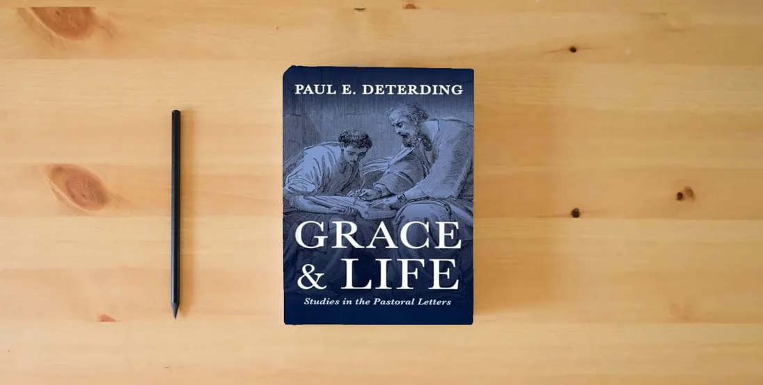 The book Grace and Life: Studies in the Pastoral Letters} is on the table