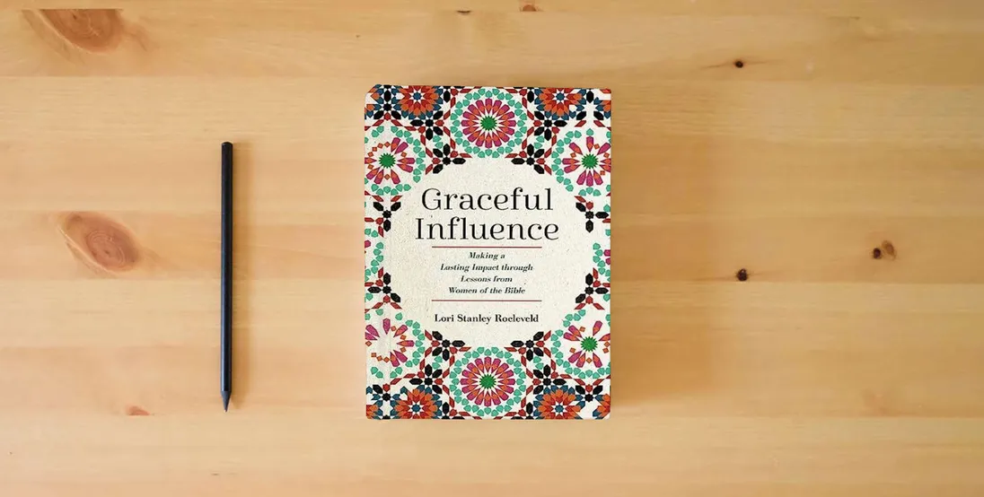 The book Graceful Influence: Making a Lasting Impact through Lessons from Women of the Bible} is on the table