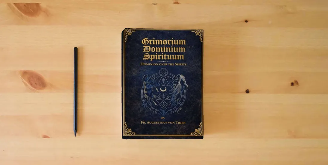 The book GRIMORIUM DOMINIUM SPIRITUUM} is on the table