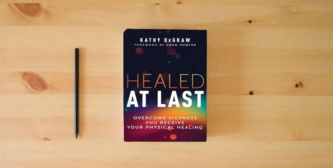 The book Healed at Last: Overcome Sickness and Receive Your Physical Healing} is on the table