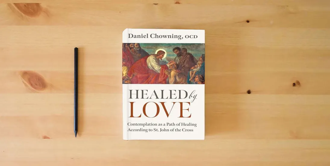 The book Healed by Love: Contemplation as a Path of Healing according to St. John of the Cross} is on the table