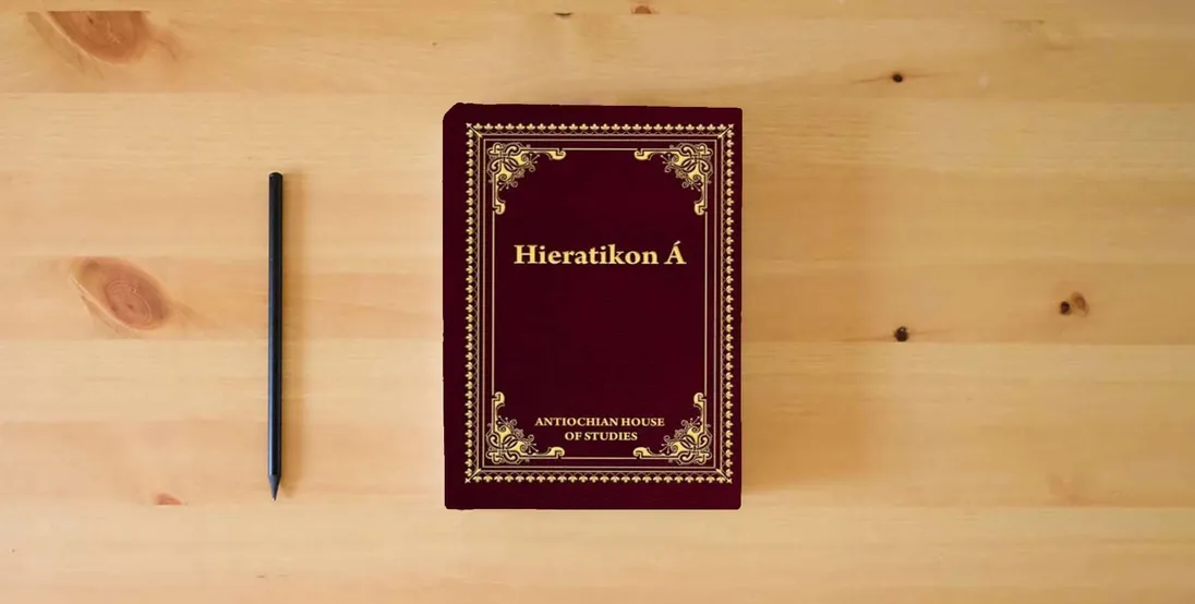 The book Hieratikon Á: The Divine Liturgy of St John Chrysostom with Complete Services and Appendices} is on the table
