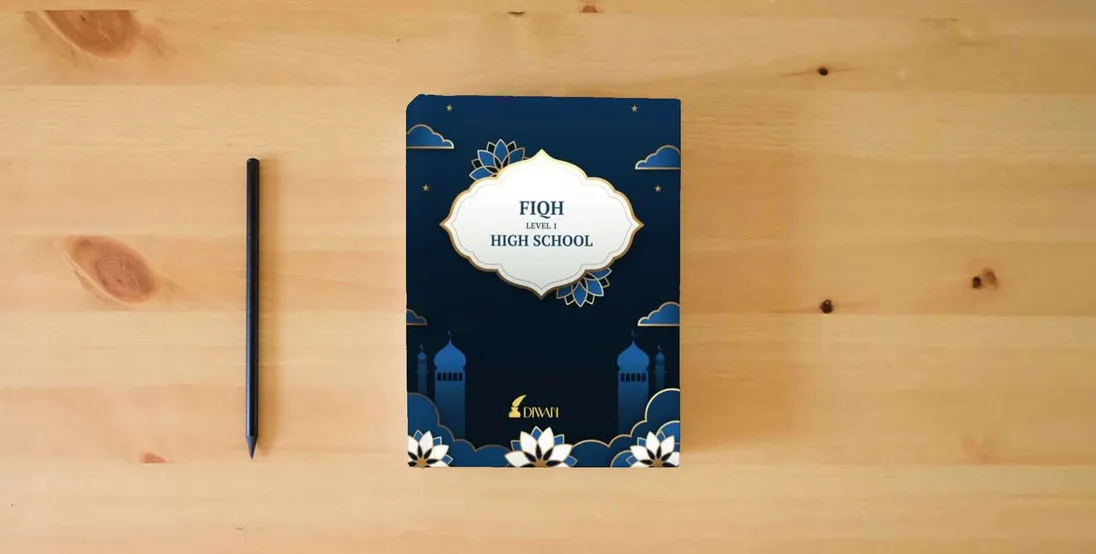 The book High School Fiqh} is on the table