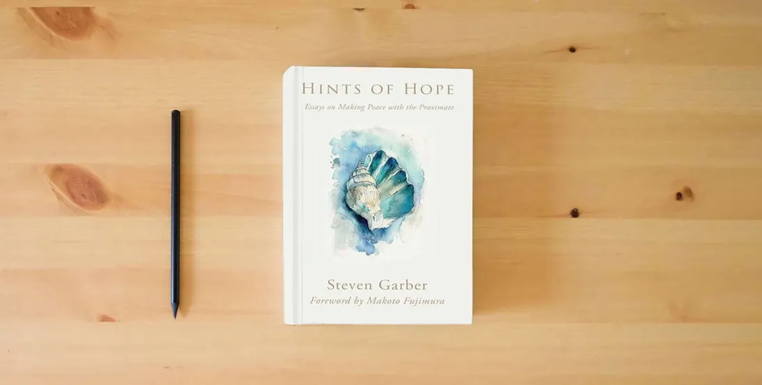 The book Hints of Hope: Essays on Making Peace with the Proximate} is on the table