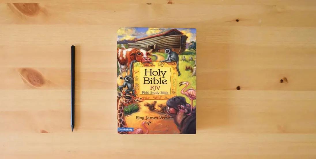 The book Holy Bible: King James Version - Kids' Study Bible} is on the table