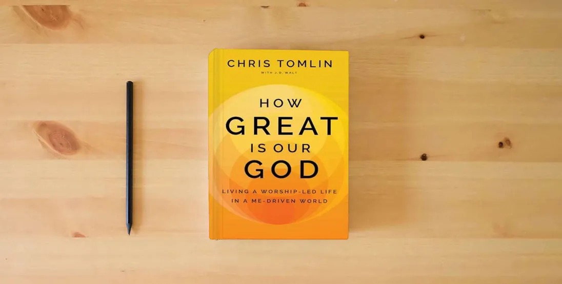 The book How Great Is Our God: Living a Worship-Led Life in a Me-Driven World} is on the table