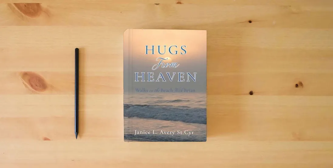 The book Hugs from Heaven: Walks on the Beach With Brian} is on the table