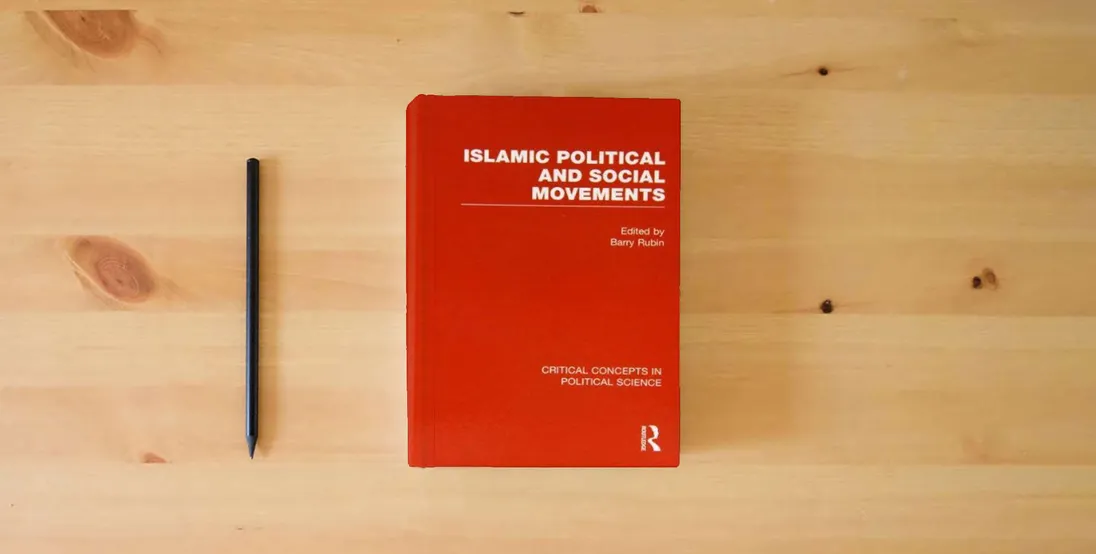 The book Islamic Political and Social Movements (Critical Concepts in Political Science)} is on the table