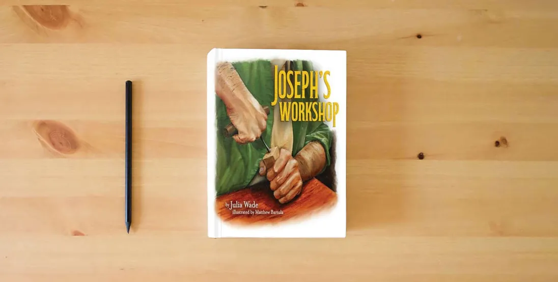 The book Joseph's Workshop} is on the table