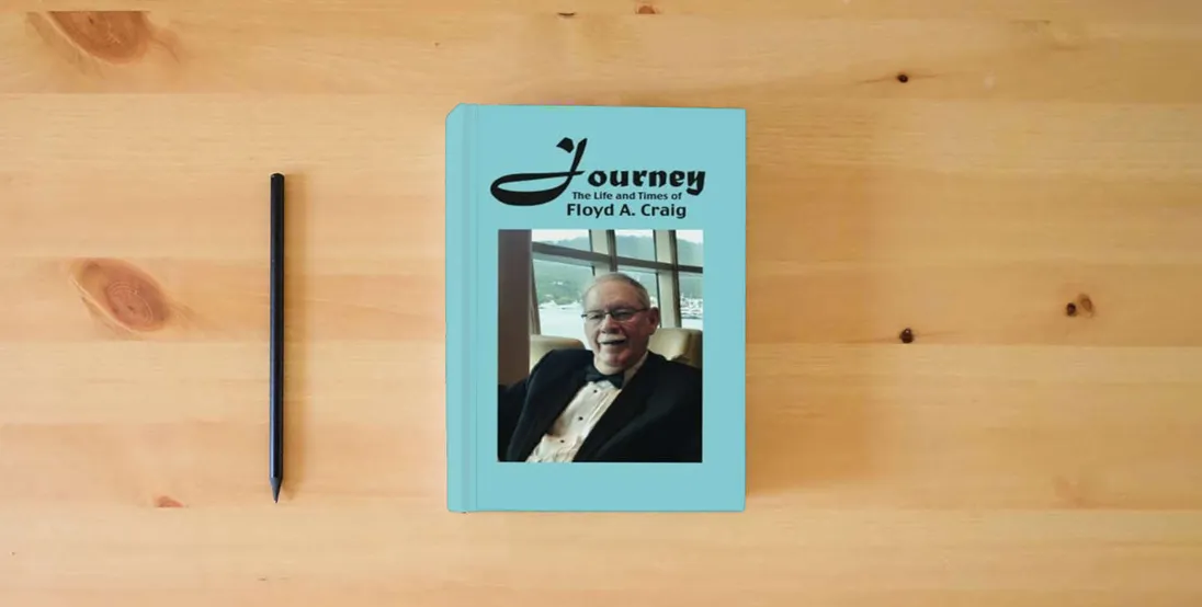 The book Journey: The Life and Times of Floyd A. Craig} is on the table